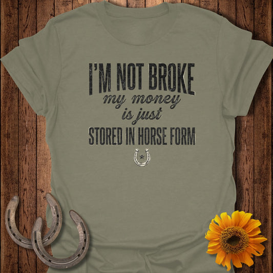 Olive green t-shirt with "I'm not broke, my money is just stored in horse form" text.