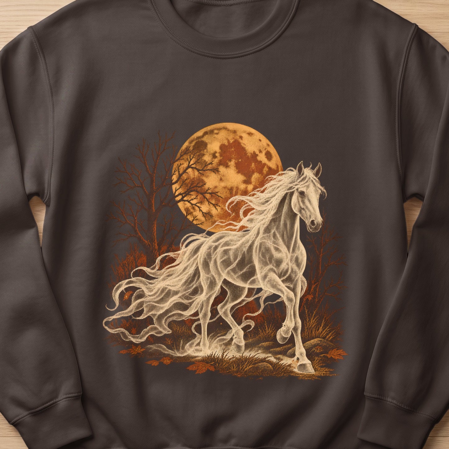 Ghostly white horse with flowing mane and tail runs in front of a full moon and trees.
