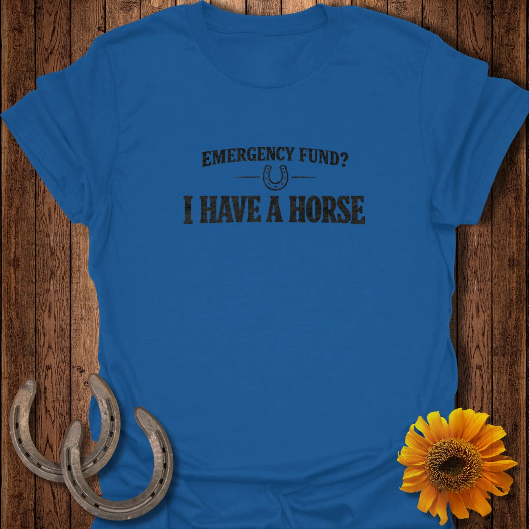 Blue t-shirt with text "EMERGENCY FUND? I HAVE A HORSE" and a horseshoe graphic.