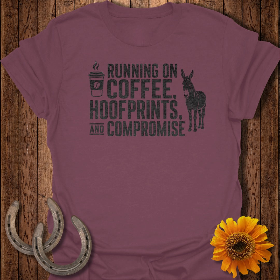 Maroon t-shirt with "Running on coffee, hoofprints, and compromise" and a donkey.