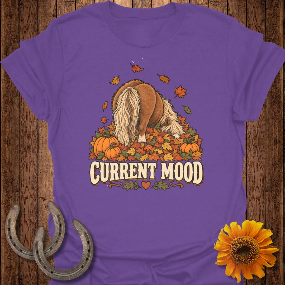 Purple t-shirt with a pony in autumn leaves and pumpkins, reads "Current Mood".