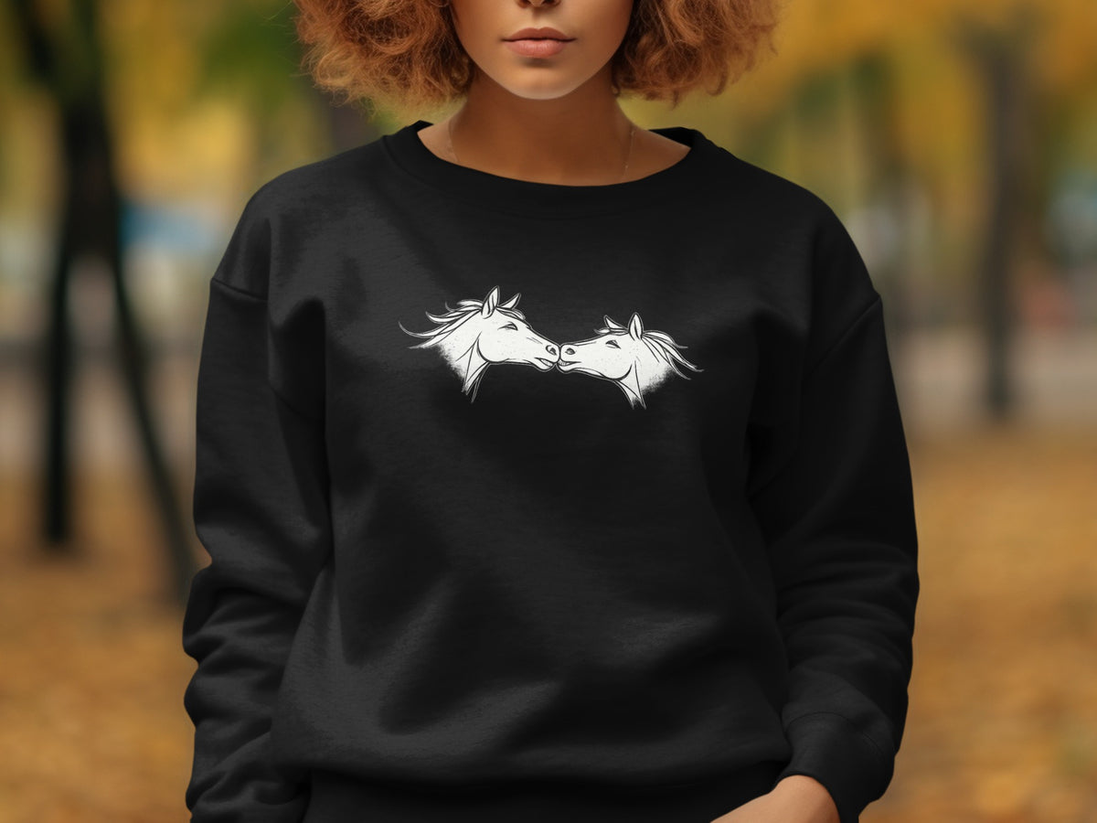 Black sweatshirt with a white line drawing of two horses nuzzling.