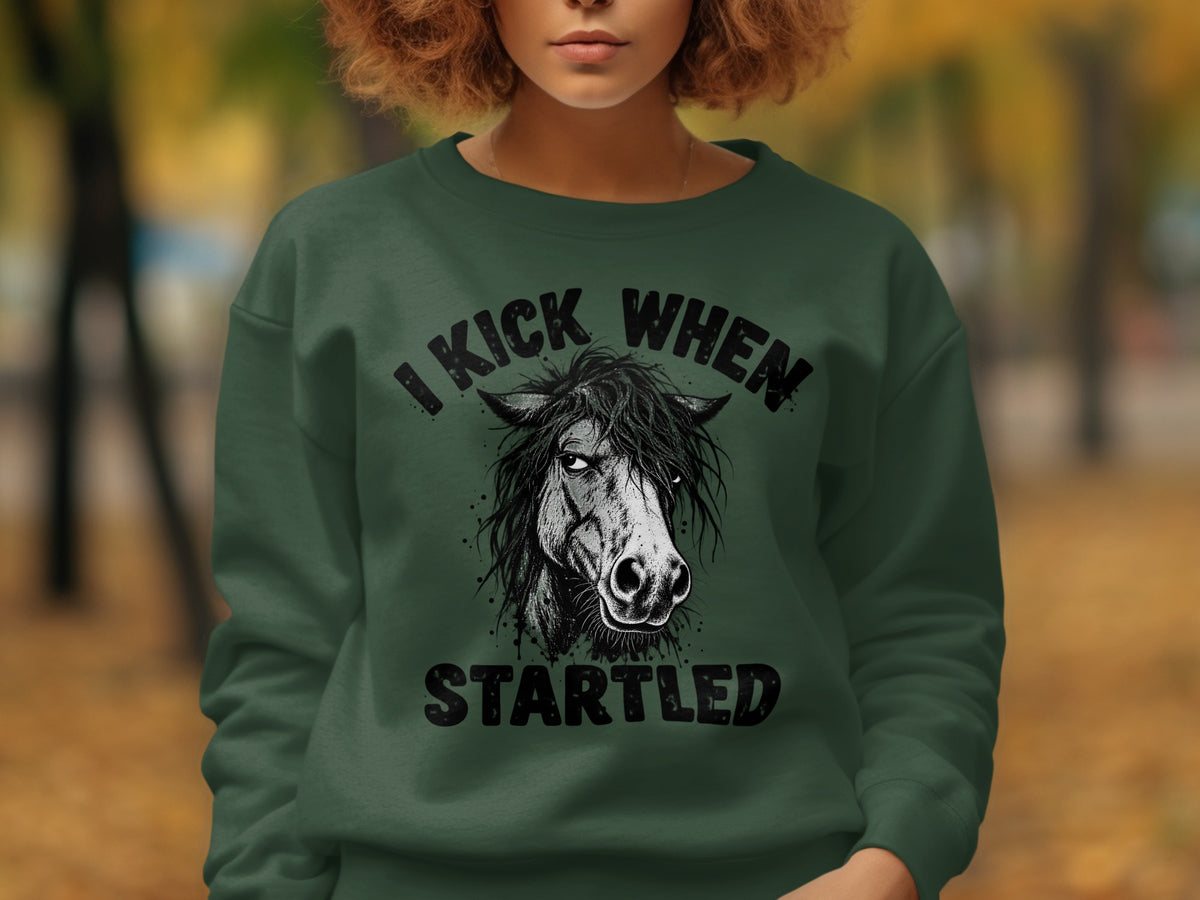 Green sweatshirt with a black illustration of a horse's head and text.
