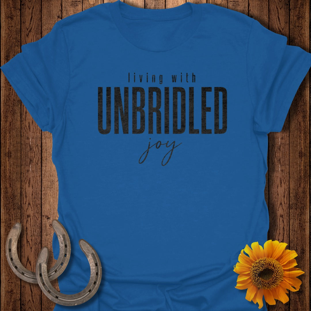 Blue t-shirt with "living with UNBRIDLED joy" text and horseshoes.