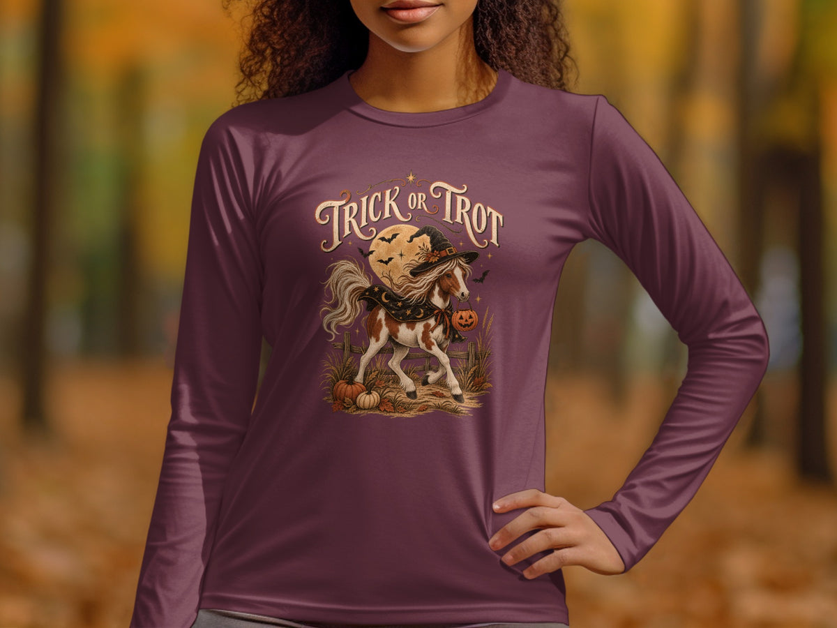 Horse with witch hat and pumpkin trick or trot Halloween graphic.