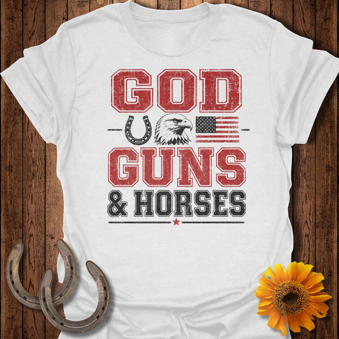 White t-shirt with red and black graphic: "GOD GUNS & HORSES" with eagle and flag.