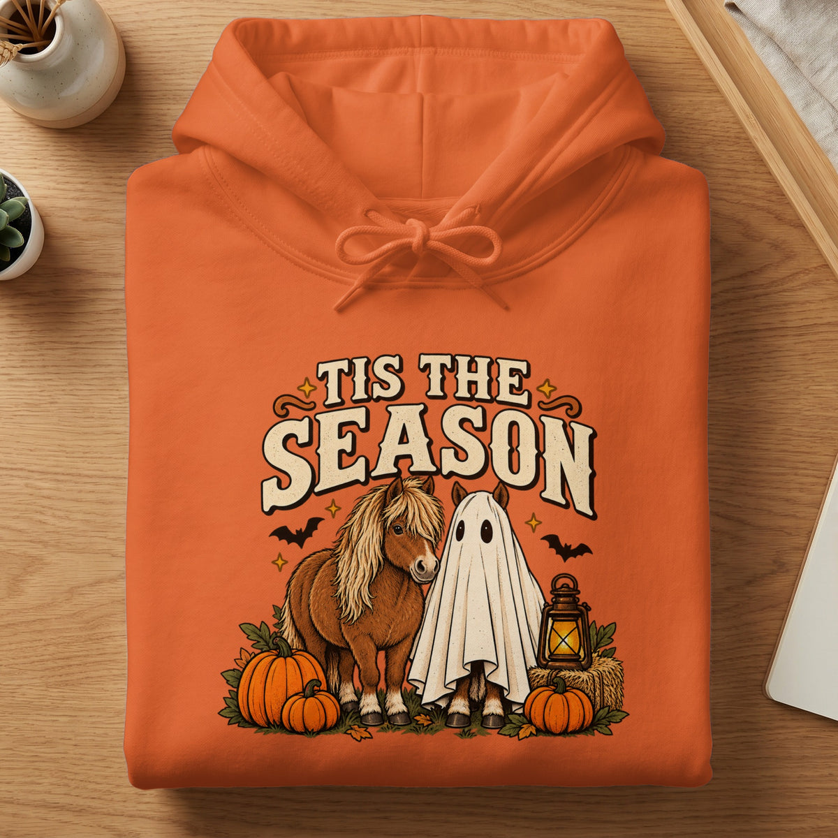 Orange hoodie with "Tis The Season" text, horse, and ghost with pumpkins.