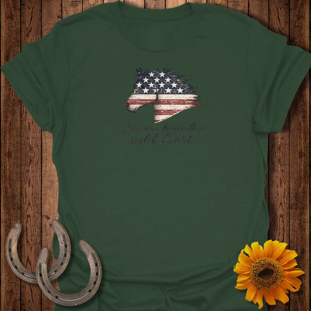 Green t-shirt with American flag horse graphic and text "She was born with a wild heart."