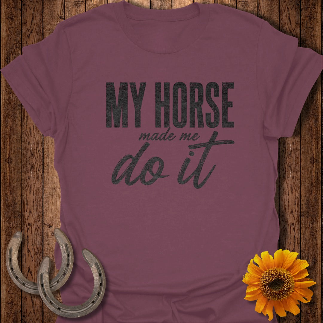 Maroon t-shirt with "MY HORSE do it" text, on wooden background with horseshoes and sunflower.