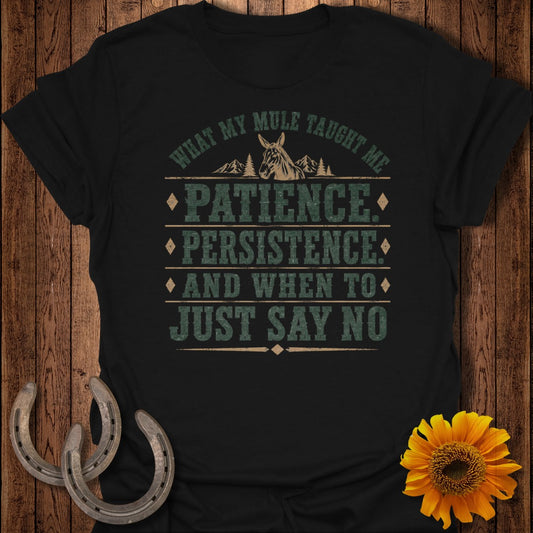Black t-shirt with "What My Mule Taught Me" text and mule graphic.