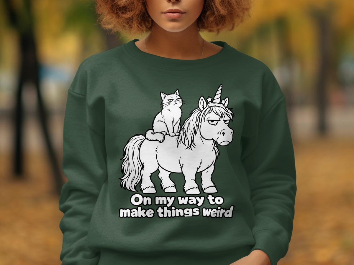 Cat riding a unicorn with text "On my way to make things weird."