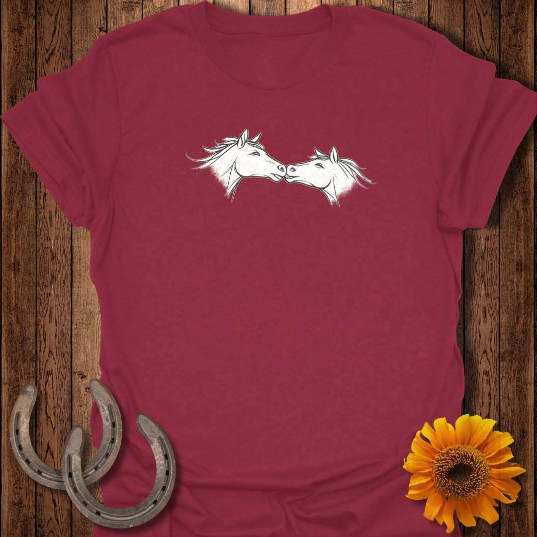 Maroon t-shirt featuring a white outline drawing of two horses nuzzling.