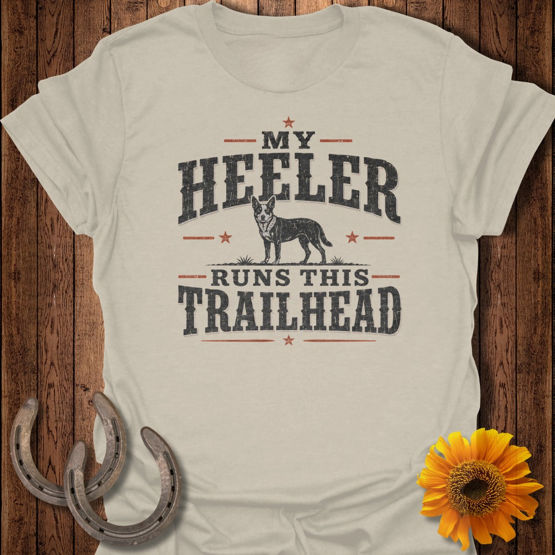 Cream t-shirt with "MY HEELER RUNS THIS TRAILHEAD" graphic and a dog.