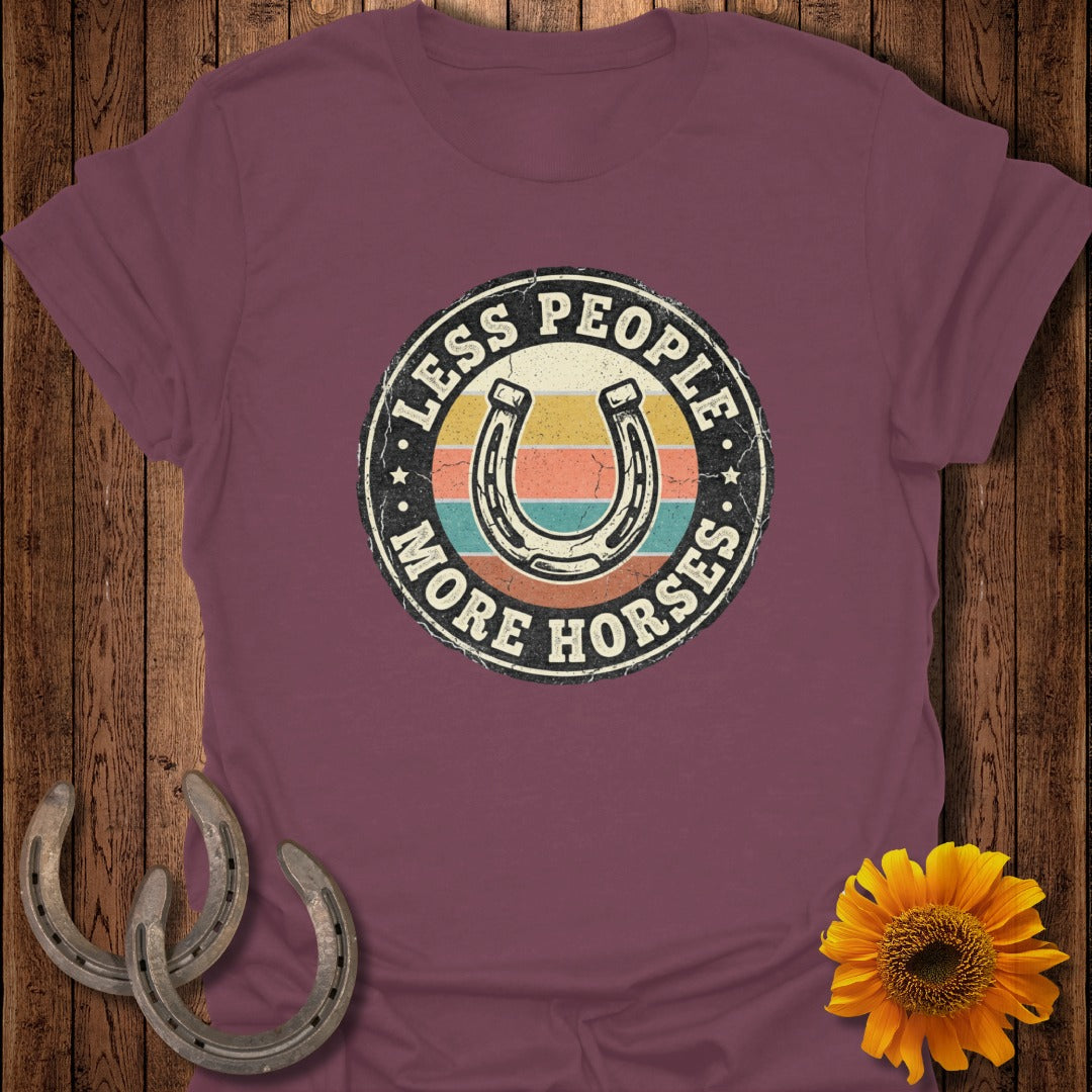 Burgundy t-shirt with "Less People More Horses" and horseshoe graphic.