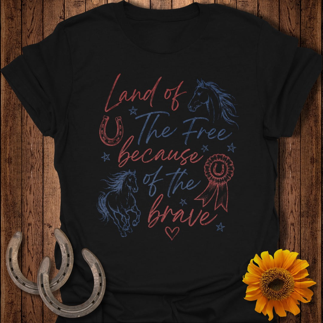 Black t-shirt with "Land of the Free because of the Brave" text and horse graphics.