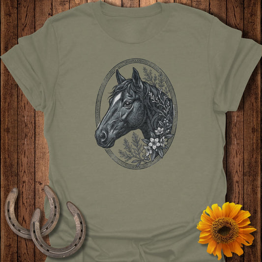 Horse head with floral wreath in oval frame on olive t-shirt.