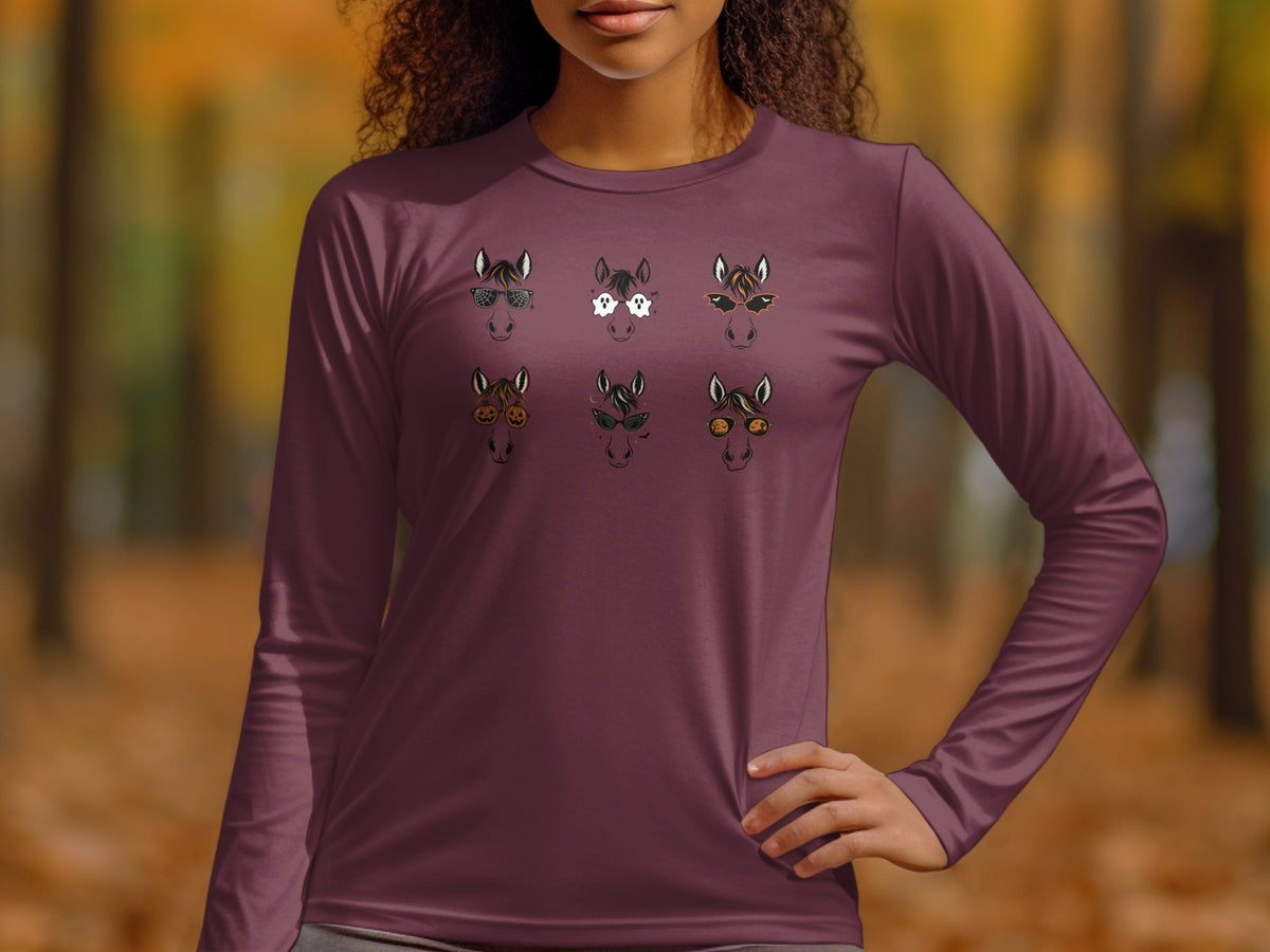Long sleeve shirt with six cartoon horses wearing Halloween-themed glasses.