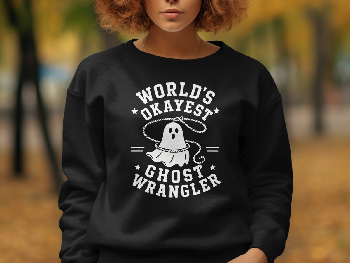 Black sweatshirt with "World's Okayest Ghost Wrangler" text and ghost graphic.