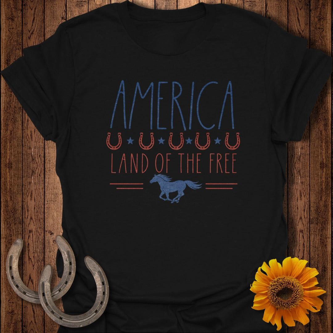 Black t-shirt with "AMERICA LAND OF THE FREE" text and a galloping horse.