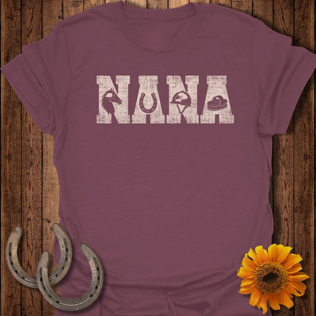 Maroon t-shirt with "NANA" in distressed white letters, flanked by horse and riding helmet icons.