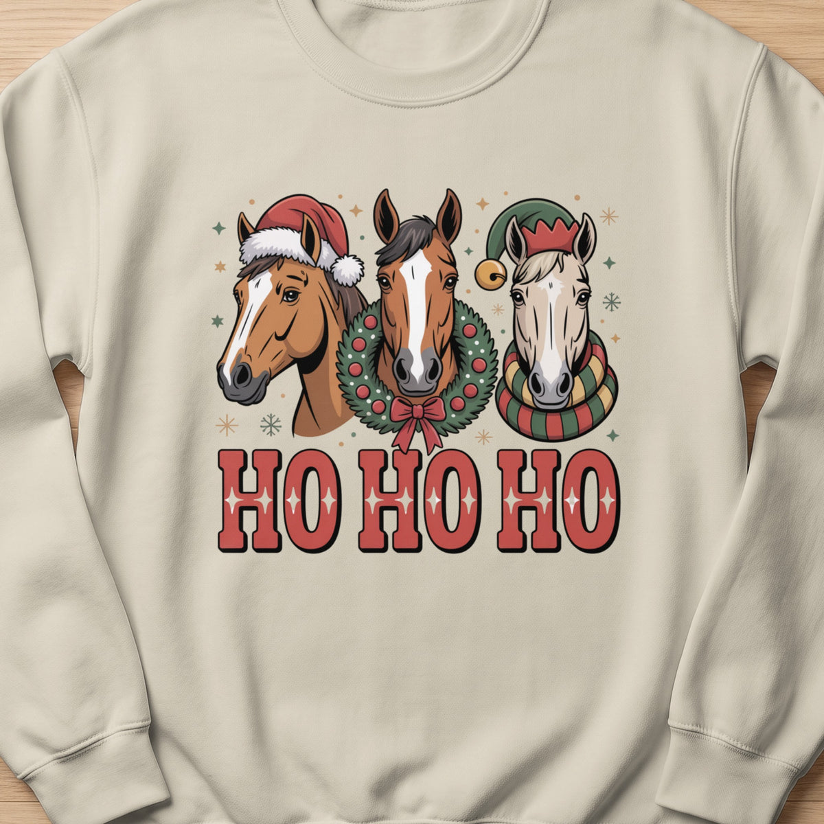 Three horses in Christmas hats and scarves with "HO HO HO" text.