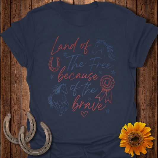 Navy t-shirt with "Land of the Free because of the Brave" and horse graphics.