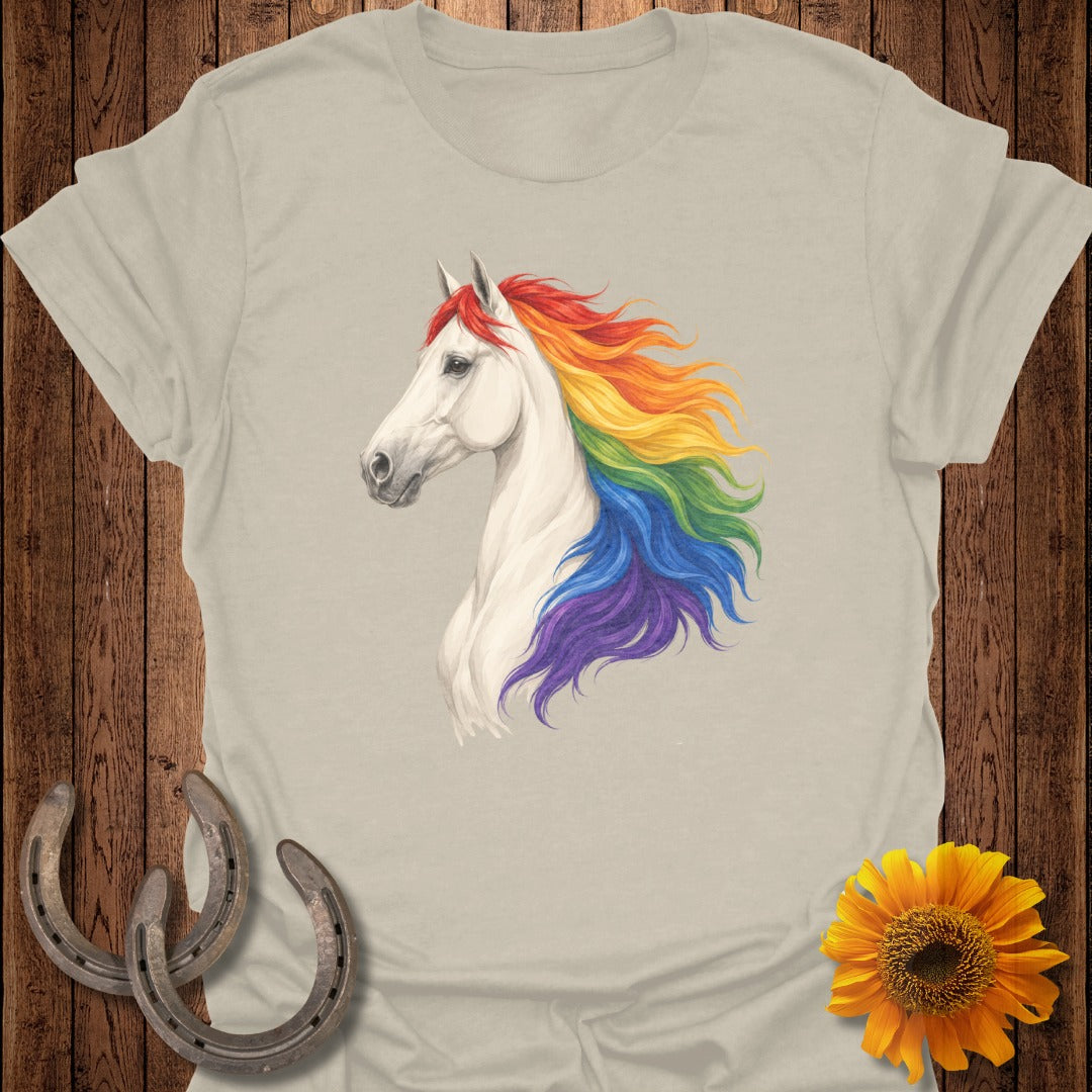 White horse with rainbow mane on beige t-shirt.