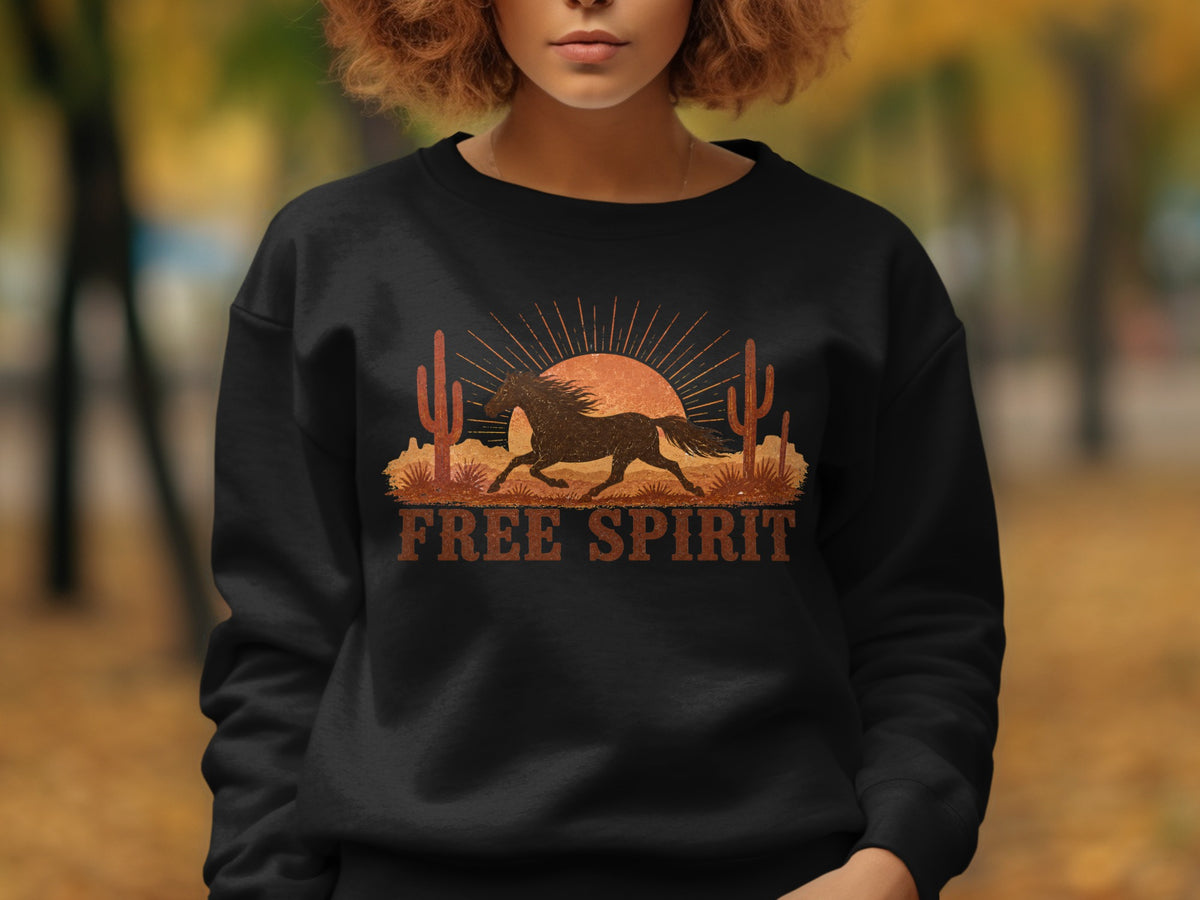 Black sweatshirt with desert scene and "FREE SPIRIT" text.