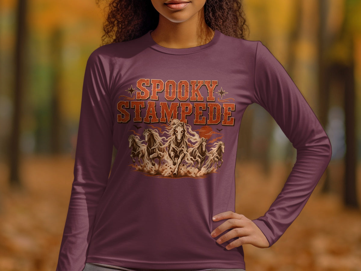 Long sleeve shirt with "Spooky Stampede" text and galloping horses graphic.
