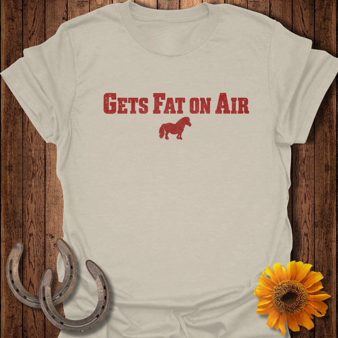 T-shirt with red text "Gets Fat On Air" and a silhouette of a horse.