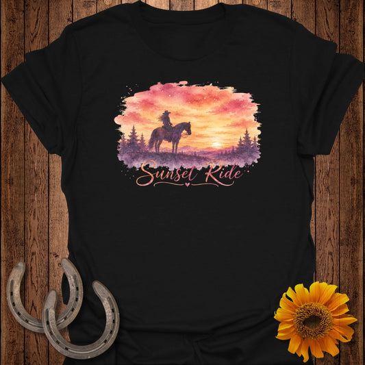 Black t-shirt with "Sunset Ride" graphic of a rider on a horse against a watercolor sunset.