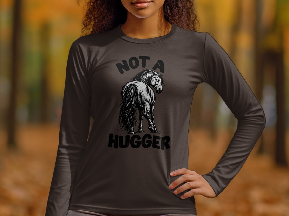 Brown long-sleeve shirt featuring a distressed graphic of a horse with "NOT A HUGGER" text.