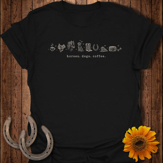 Black t-shirt with line drawing of horses, dogs, and coffee cup with text.
