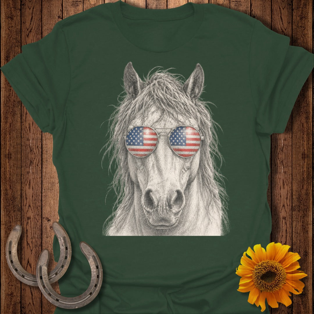 Horse wearing American flag sunglasses, on a dark green t-shirt.
