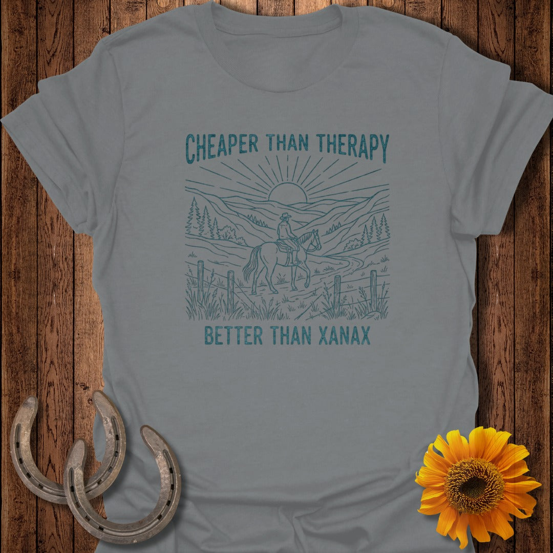 Grey t-shirt with "Cheaper Than Therapy, Better Than Xanax" text and horse rider graphic.