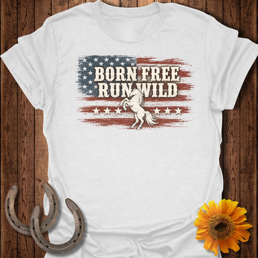 White t-shirt with "BORN FREE RUN WILD" text over distressed US flag and prancing horse.