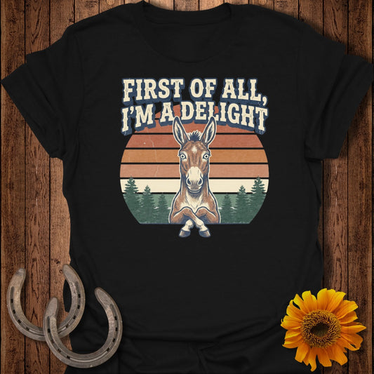 T-shirt with donkey graphic and text "First of all, I'm a delight".