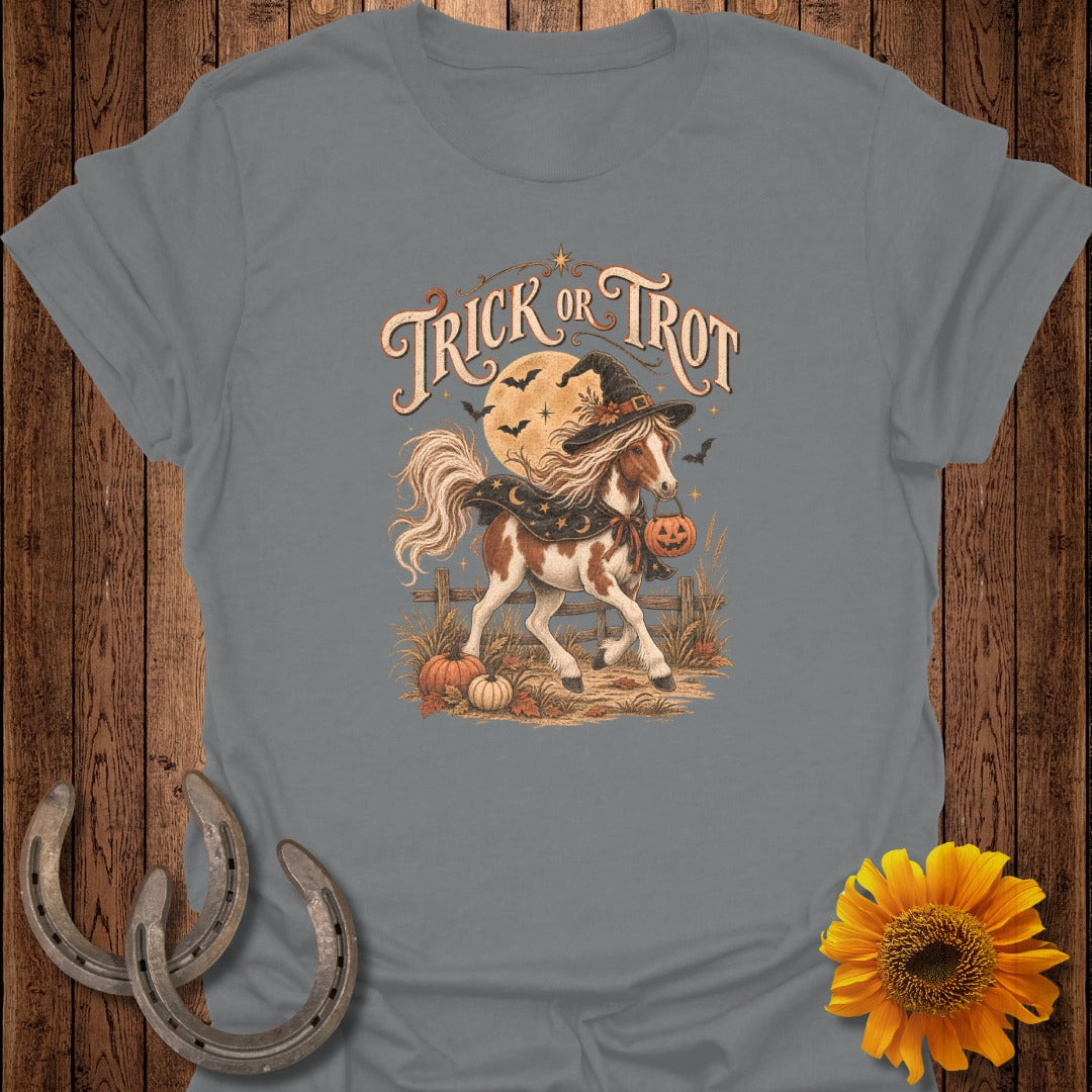 Horse wearing witch hat and carrying pumpkin, with "Trick or Trot" text.