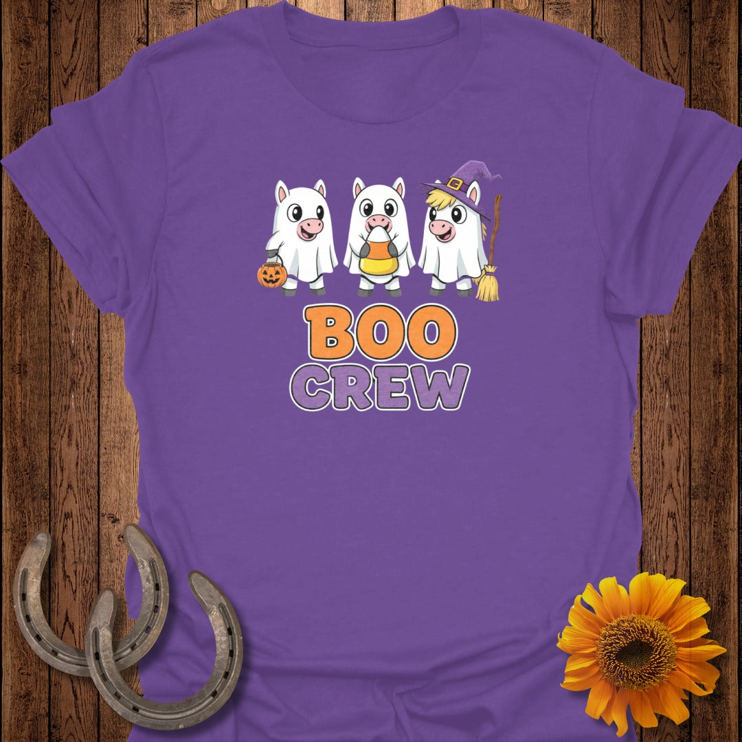 Purple t-shirt with "Boo Crew" text and three cartoon ghosts holding candy.
