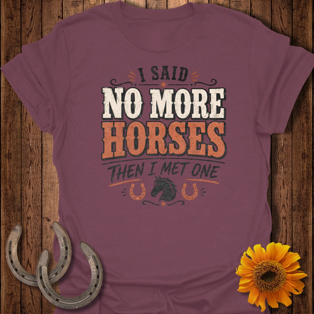 Burgundy t-shirt with "I said no more horses then I met one" graphic.