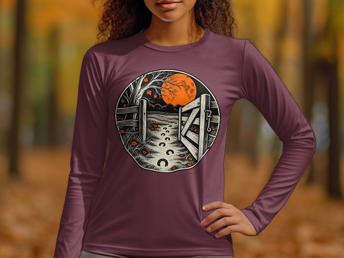 Circular graphic with an open gate, horseshoe prints, and a large orange moon.