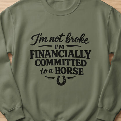 Olive green sweatshirt with text "I'm not broke I'm financially committed to a horse" and a horseshoe.