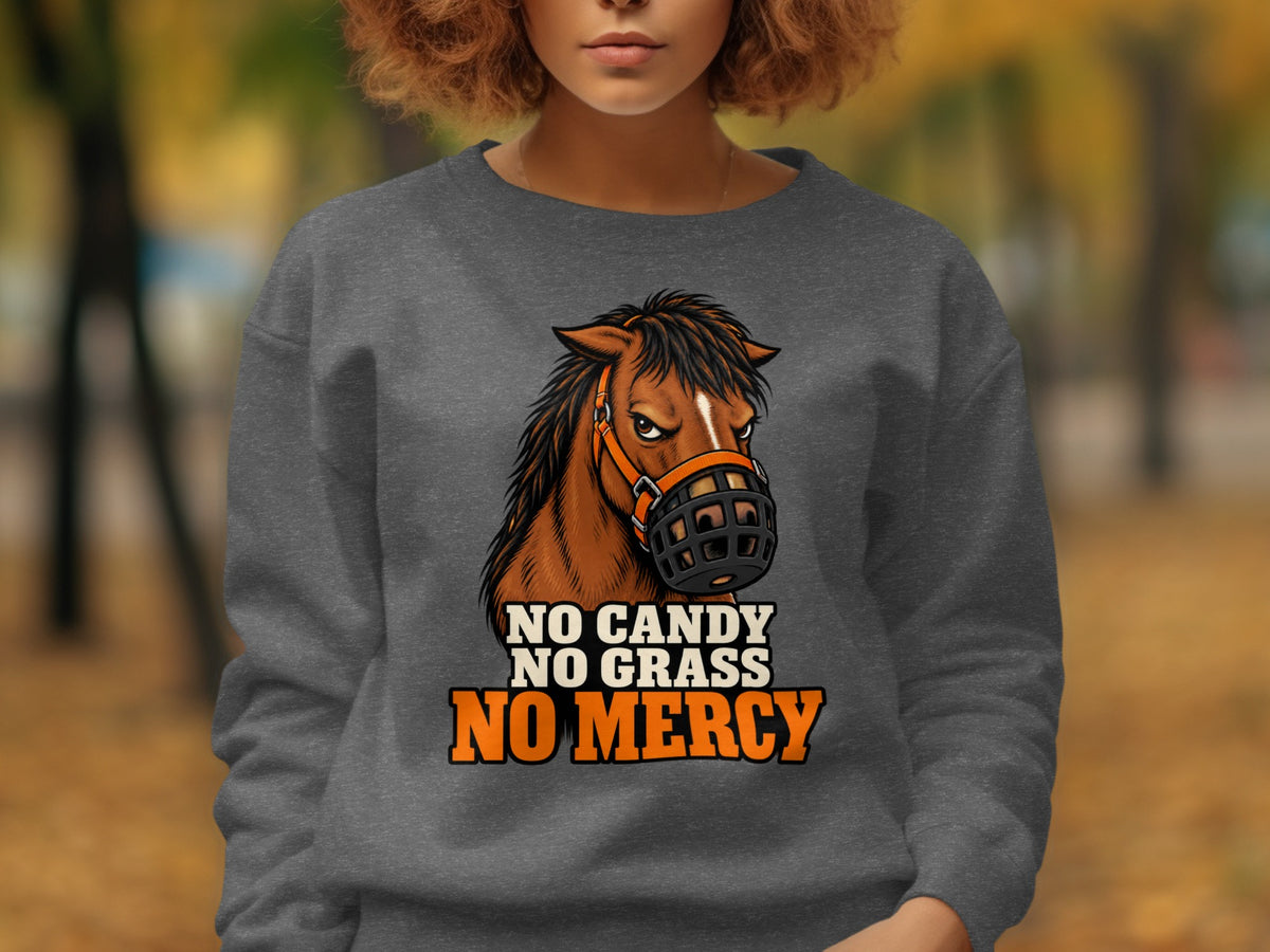 Horse with muzzle on dark gray sweatshirt, text "NO CANDY NO GRASS NO MERCY".