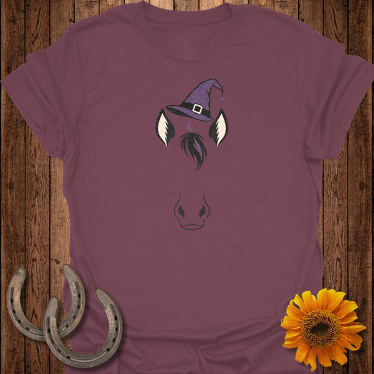 Plum t-shirt with a witch hat, horse ears, mane, and nose design.