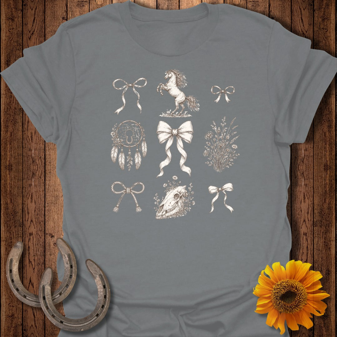 Gray t-shirt with scattered floral, equine, and bow designs.