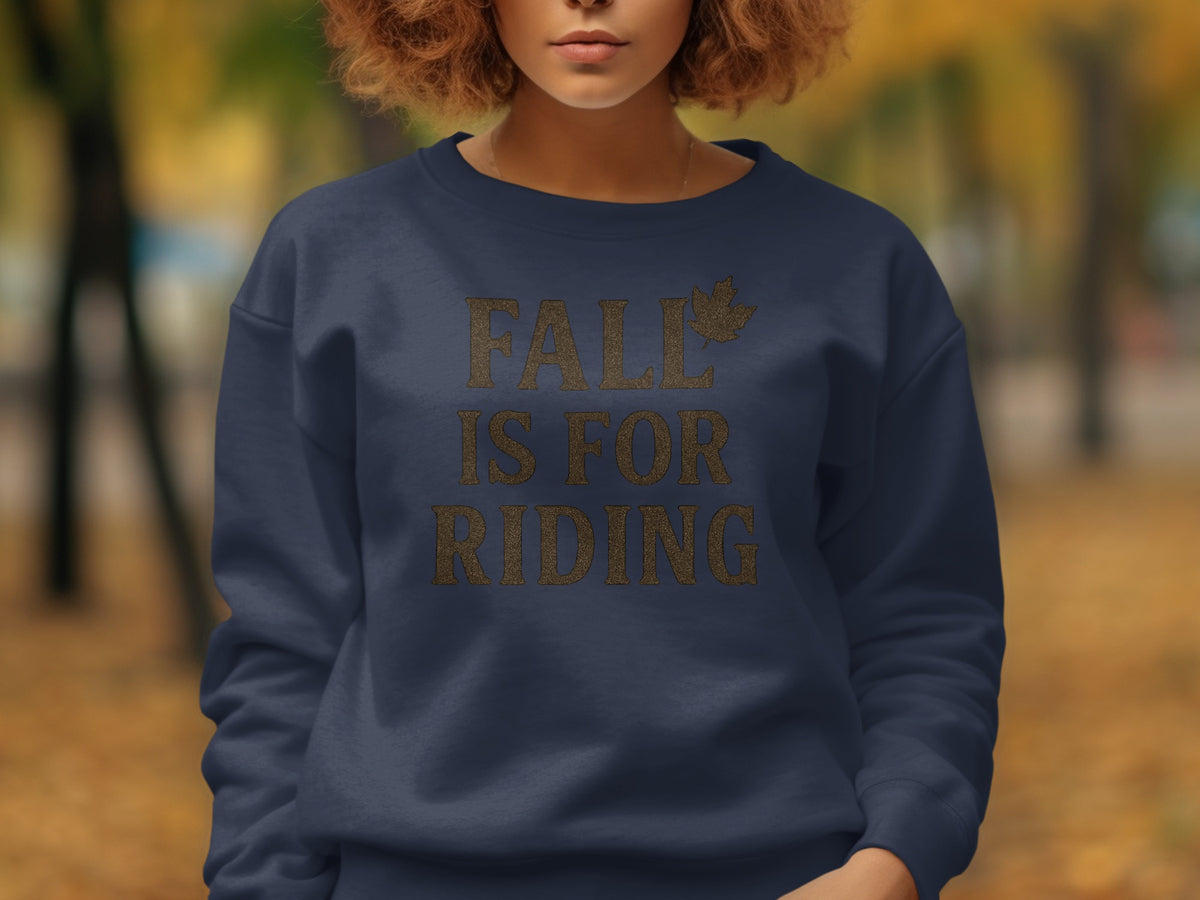 Navy sweatshirt with "FALL IS FOR RIDING" and a leaf graphic.
