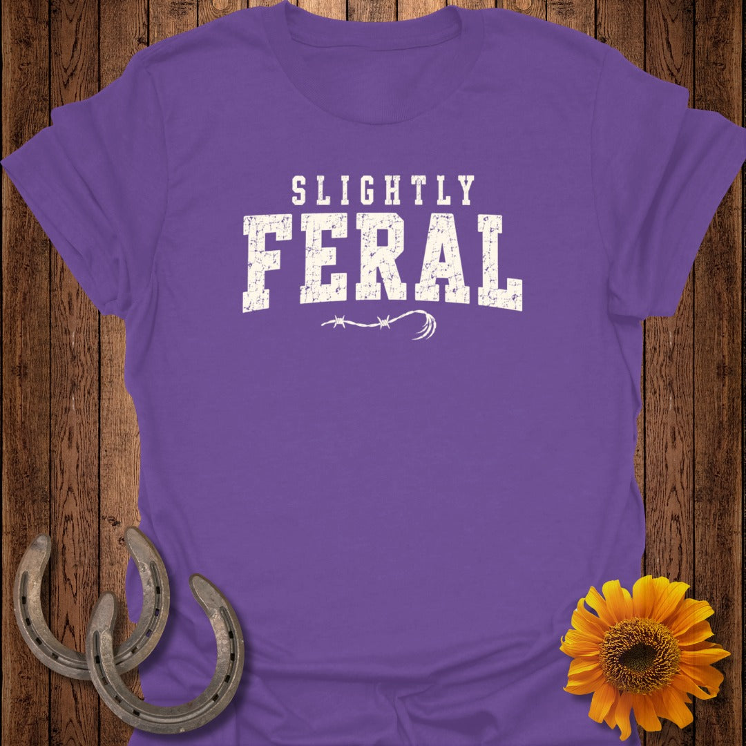 Purple t-shirt with distressed "Slightly Feral" text and barbed wire design.