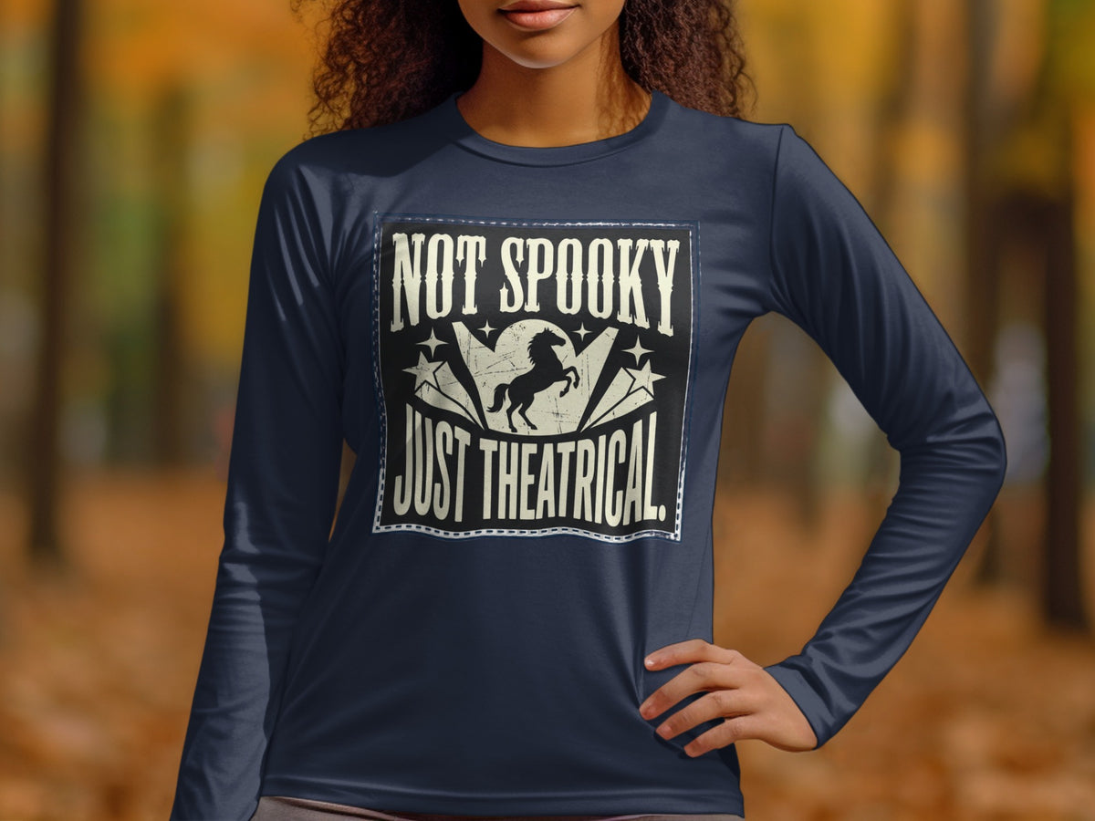 Dark blue long sleeve shirt with "NOT SPOOKY JUST THEATRICAL" text and unicorn silhouette graphic.