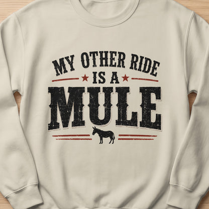 Cream sweatshirt with "My Other Ride Is A Mule" text and a silhouette of a mule.