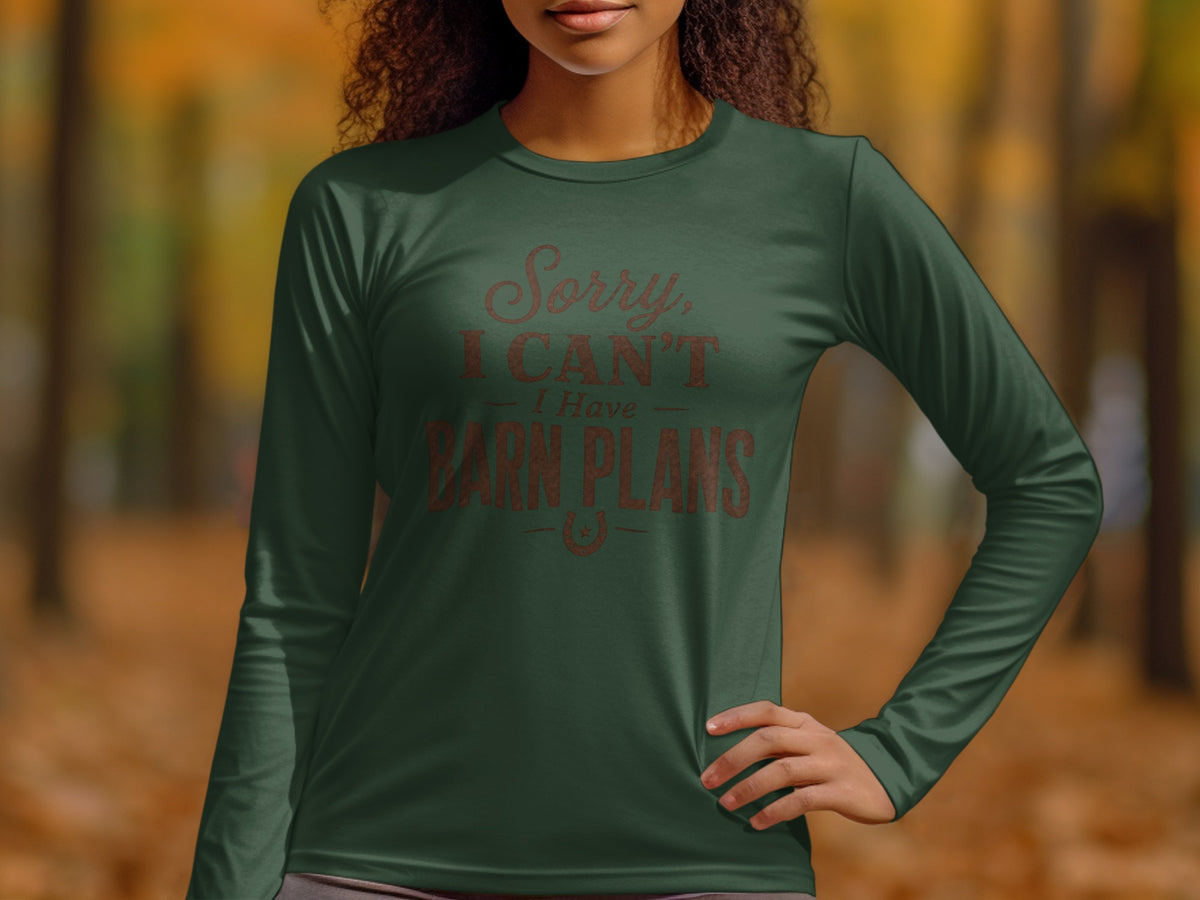 Long sleeve shirt with "Sorry, I CAN'T HAVE BARN PLANS" text and horseshoe graphic.
